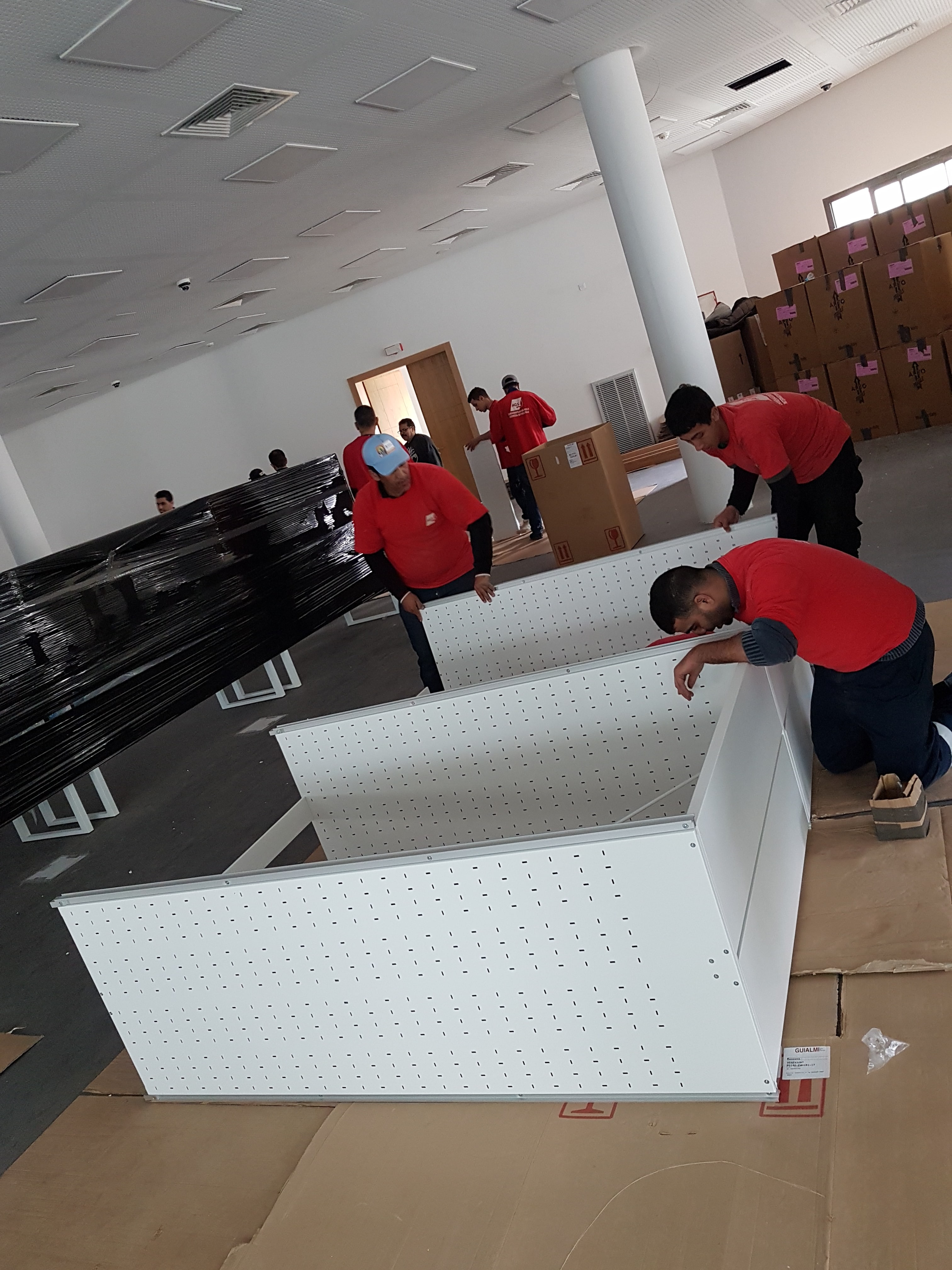 AGS Movers team assembling furniture.